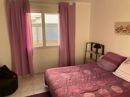 Ένα ή περισσότερα κρεβάτια σε δωμάτιο στο Chambre au calme