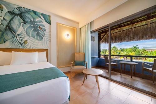 Ένα ή περισσότερα κρεβάτια σε δωμάτιο στο Iberostar Selection Paraíso Lindo - All Inclusive