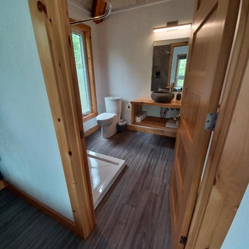 Posezení v ubytování Pine Brae Eco-Resort