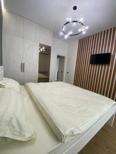 Postel nebo postele na pokoji v ubytování Relax apartment стильні апартаменти біля озера авторський ремонт