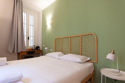 Cama o camas de una habitación en Youhosty - Ticinese Suite 4