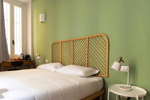 Cama o camas de una habitación en Youhosty - Ticinese Suite 4