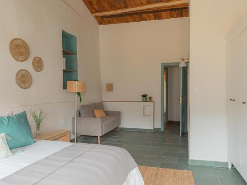 Ένα ή περισσότερα κρεβάτια σε δωμάτιο στο Casa Marela