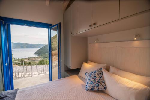 Postel nebo postele na pokoji v ubytování ONIRO Villas