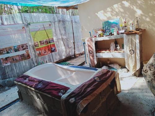Postel nebo postele na pokoji v ubytování JUNGLE GYM LA UNION Prana fan kubo 2 pax