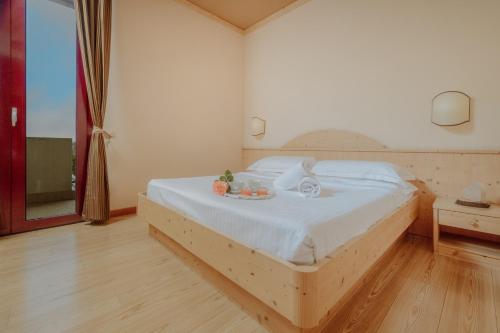 Ένα ή περισσότερα κρεβάτια σε δωμάτιο στο Garden Relais