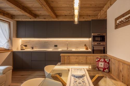 Kuchyň nebo kuchyňský kout v ubytování Incantevole appar chalet nuovo