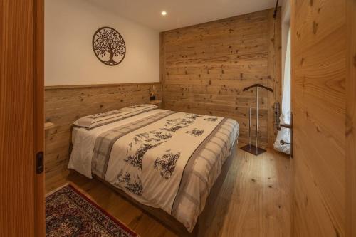 Postel nebo postele na pokoji v ubytování Incantevole appar chalet nuovo