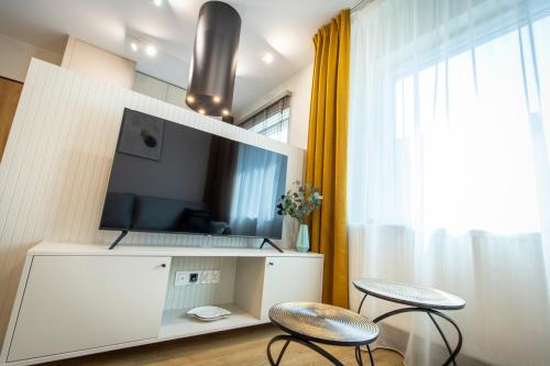 Μια τηλεόραση ή/και κέντρο ψυχαγωγίας στο Navigare Apartments