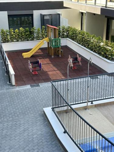 a playground with a slide in a building at Casa deBoer in Jávea