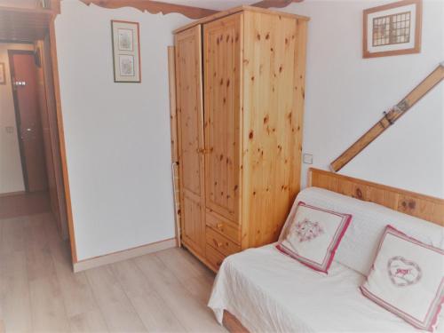 Postel nebo postele na pokoji v ubytování Studio cosy pour 2 à Tignes, pied des pistes et commerces - FR-1-411-488