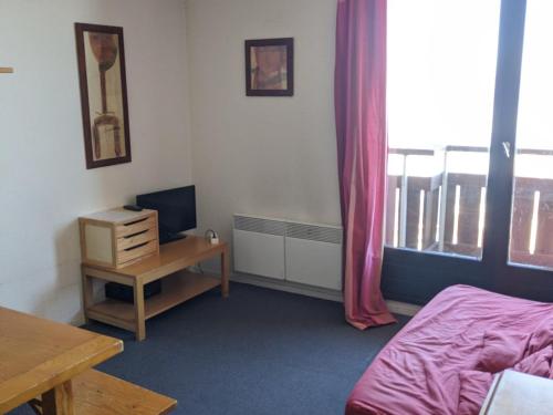 Appartement 2 pièces au pied des pistes avec balcon - FR-1-557-83