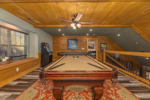 a pool table in a room with a ceiling at Beautiful Vista by Eden Crest in Pigeon Forge