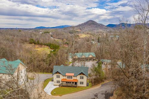 an aerial view of a house with a mountain in the background at Beautiful Vista by Eden Crest in Pigeon Forge