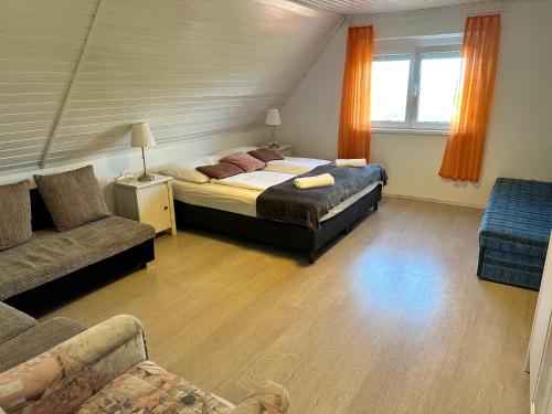 Katil atau katil-katil dalam bilik di Szent Orbán Panzió - Kutyabarát apartmanok
