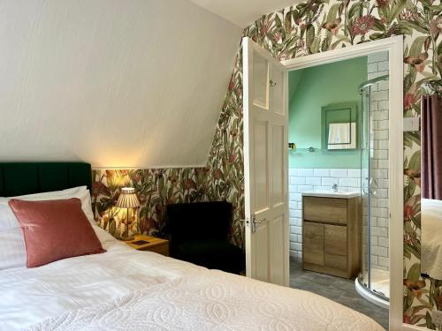 Postel nebo postele na pokoji v ubytování Southcliffe B&B