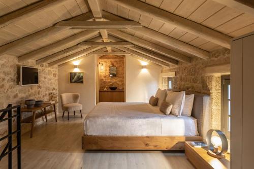 Postel nebo postele na pokoji v ubytování Korona Boutique Hotel
