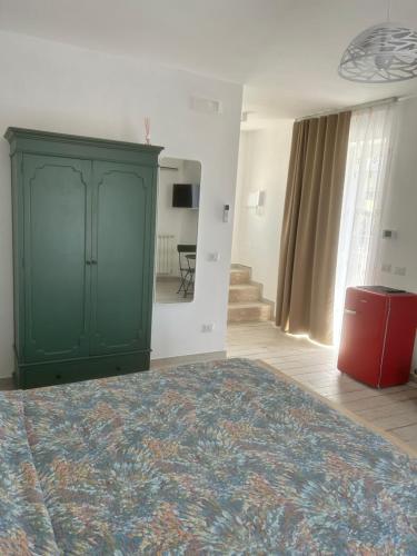 Postel nebo postele na pokoji v ubytování LA CASA DI PIETRA