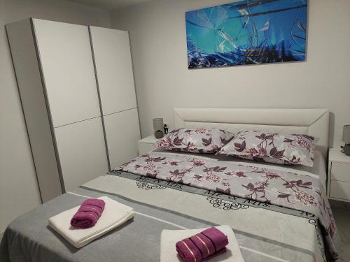 Postel nebo postele na pokoji v ubytování Sandra