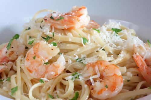a plate of pasta with shrimp and cheese at Sheraton Fallsview Hotel in Niagara Falls
