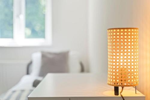 a lamp sitting on a table in a room at Perfect Contractor Stay - Sleeps 6 - FREE Parking in Sheldon