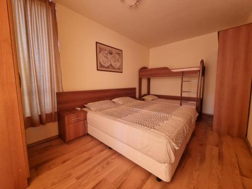 Postel nebo postele na pokoji v ubytování Apartment Kalin complex Aurelia-RAVDA