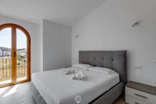 Postel nebo postele na pokoji v ubytování Mandarin Apartment 5