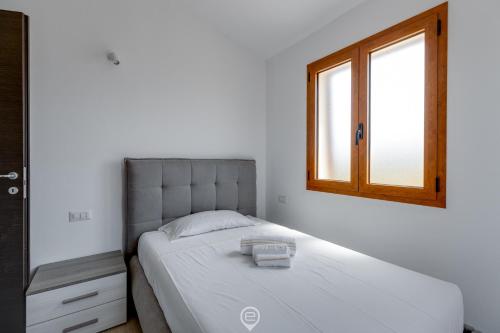 Postel nebo postele na pokoji v ubytování Mandarin Apartment 5