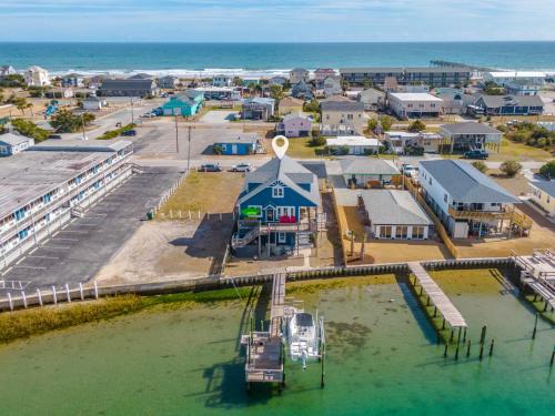 an aerial view of a small town next to the ocean at Sea Chase in Topsail Beach