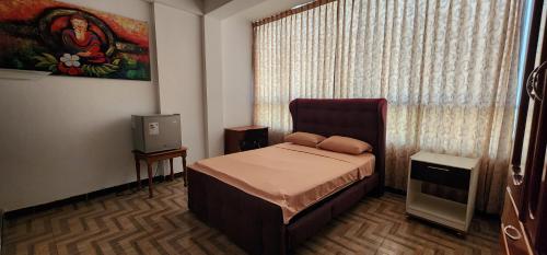 Кровать или кровати в номере Makasai Habitaciones