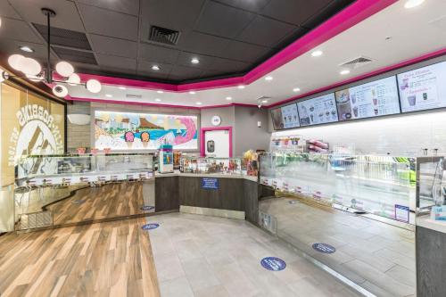 a grocery store with a bowling alley at Sheraton Waikiki Beach Resort in Honolulu