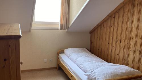 Letto o letti in una camera di Parkhotel Beatenberg