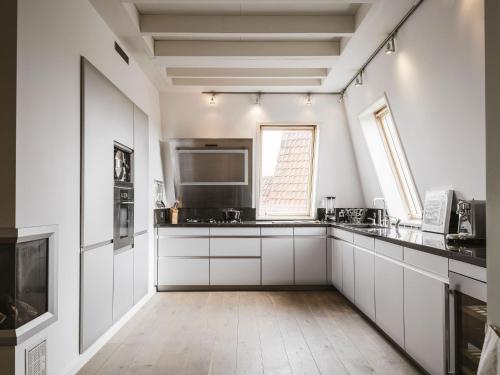 Η κουζίνα ή μικρή κουζίνα στο Appartementen Domburg