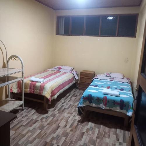Katil atau katil-katil dalam bilik di Jany House