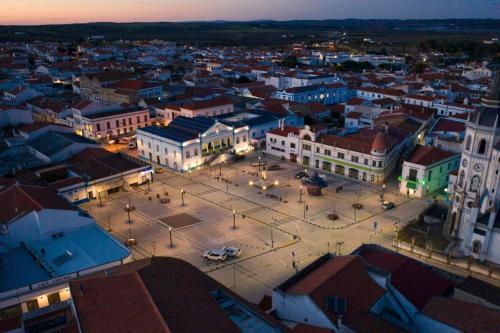 an aerial view of a city at night at A Janela do Conforto in Reguengos de Monsaraz