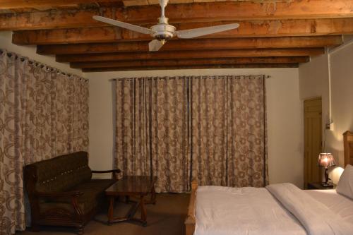 Postel nebo postele na pokoji v ubytování West End Lodges