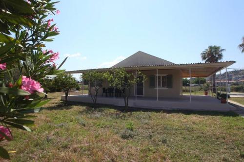 a small house with a roof at Olga Home Agios Ioannis Lefkada - Lefkada BnB in Lefkada Town