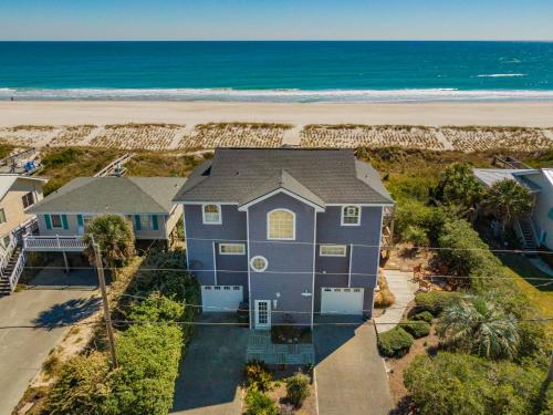 an aerial view of a house and the beach at Serendipity in Surf City