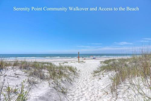 a view of a sandy beach with the ocean at Serenity Now in Topsail Beach