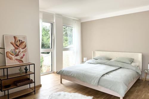 Postel nebo postele na pokoji v ubytování Modernes Studio beim Domplatz