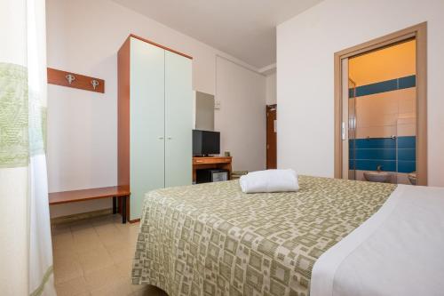 Katil atau katil-katil dalam bilik di Hotel Il Gabbiano