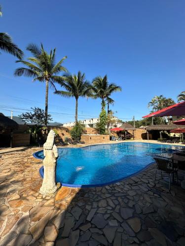Der Swimmingpool an oder in der Nähe von Hotel Pousada dos Condes
