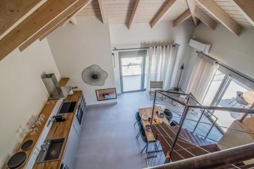 an overhead view of a kitchen and living room at blue symphony suites and apartments in Nikiana