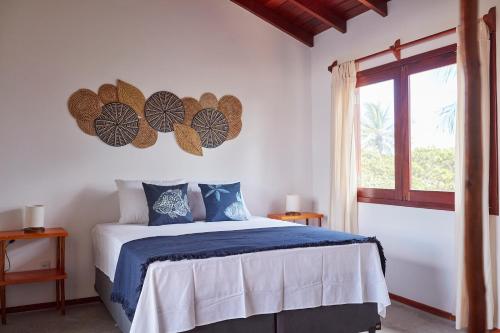 Katil atau katil-katil dalam bilik di Condomínio Villa Conduru - Casa completa