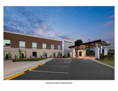 a parking lot in front of a hospital at Holiday Inn Express Wilson I-95 by IHG in Wilson