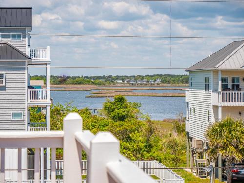 a view of the water from the balcony of a house at Skippers Hideout in North Topsail Beach