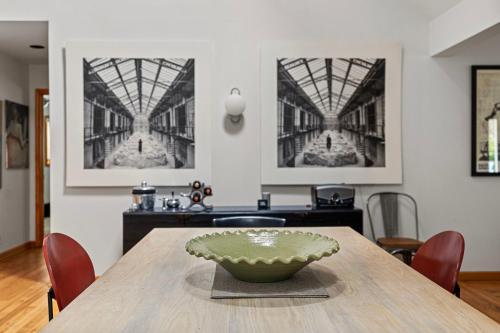 a dining room table with a bowl on top of it at Casa Azur in Union Pier
