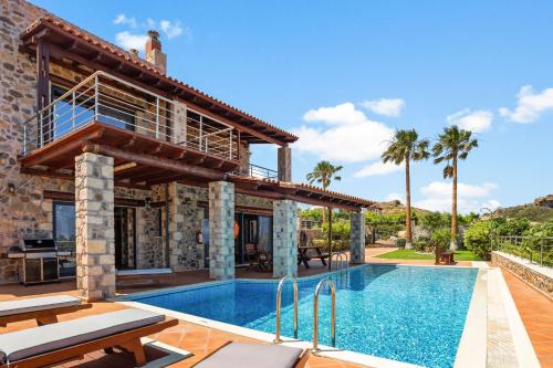 Πισίνα στο ή κοντά στο Kambos Horizon & Paradise Villas