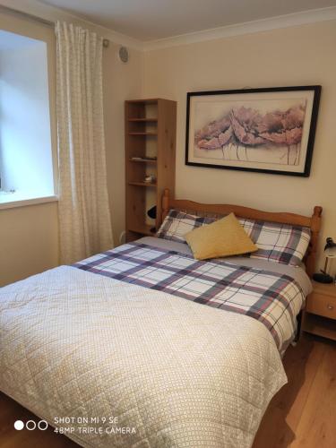 Postel nebo postele na pokoji v ubytování Bernie's Place - Homestay