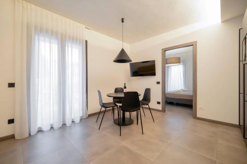 TV o dispositivi per l'intrattenimento presso ApartmentsGarda - Residenza Garda Deluxe